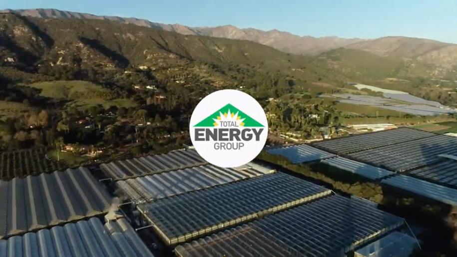 Total Energy Group Logo Over Greenhouse